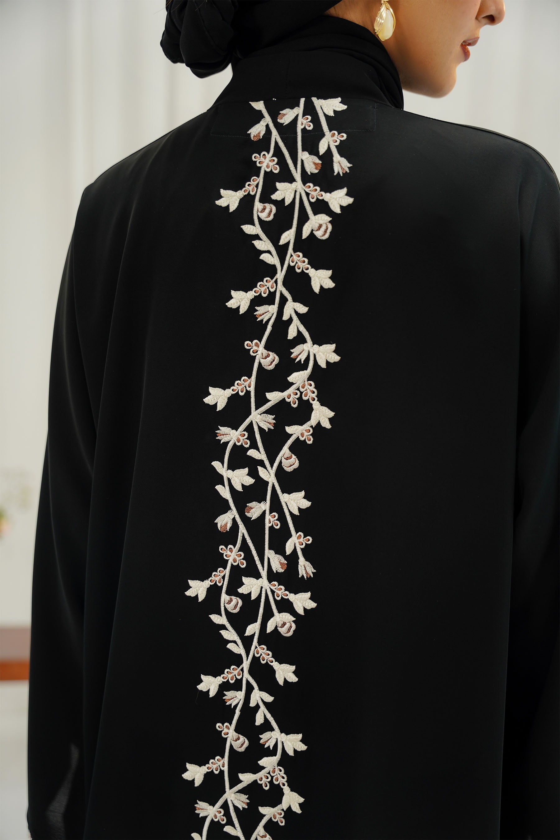 Stella Abaya | Buttoned Up